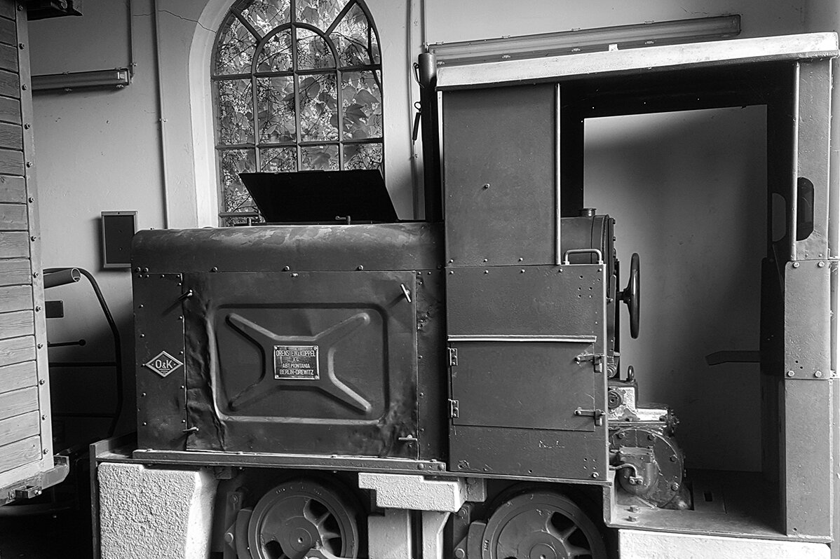 Diesel locomotive by manufacturer Orenstein & Koppel in black and white