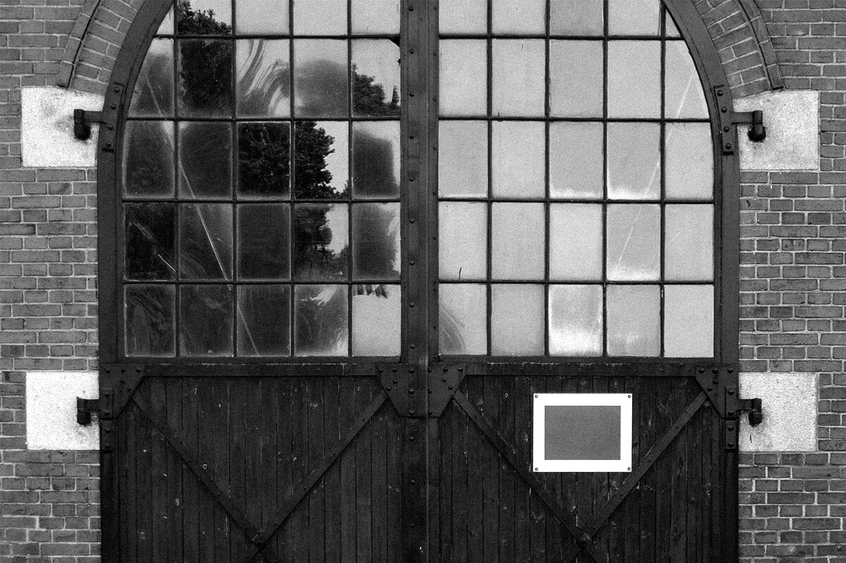 Gate of the engine shed in black and white