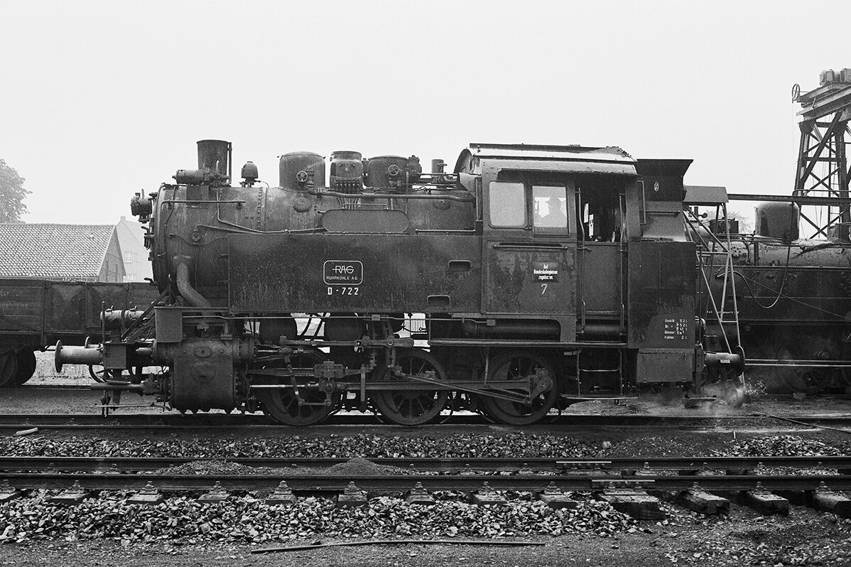 Side view of the steam locomotive 80-013 in black and white
