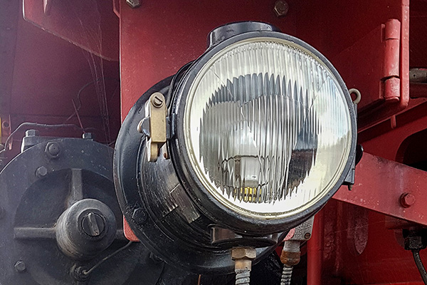 Close up of the headlight of the locomotive 01-164