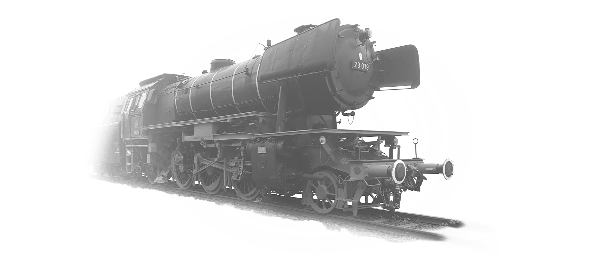The locomotive 23-109 is going towards the camera in black and white