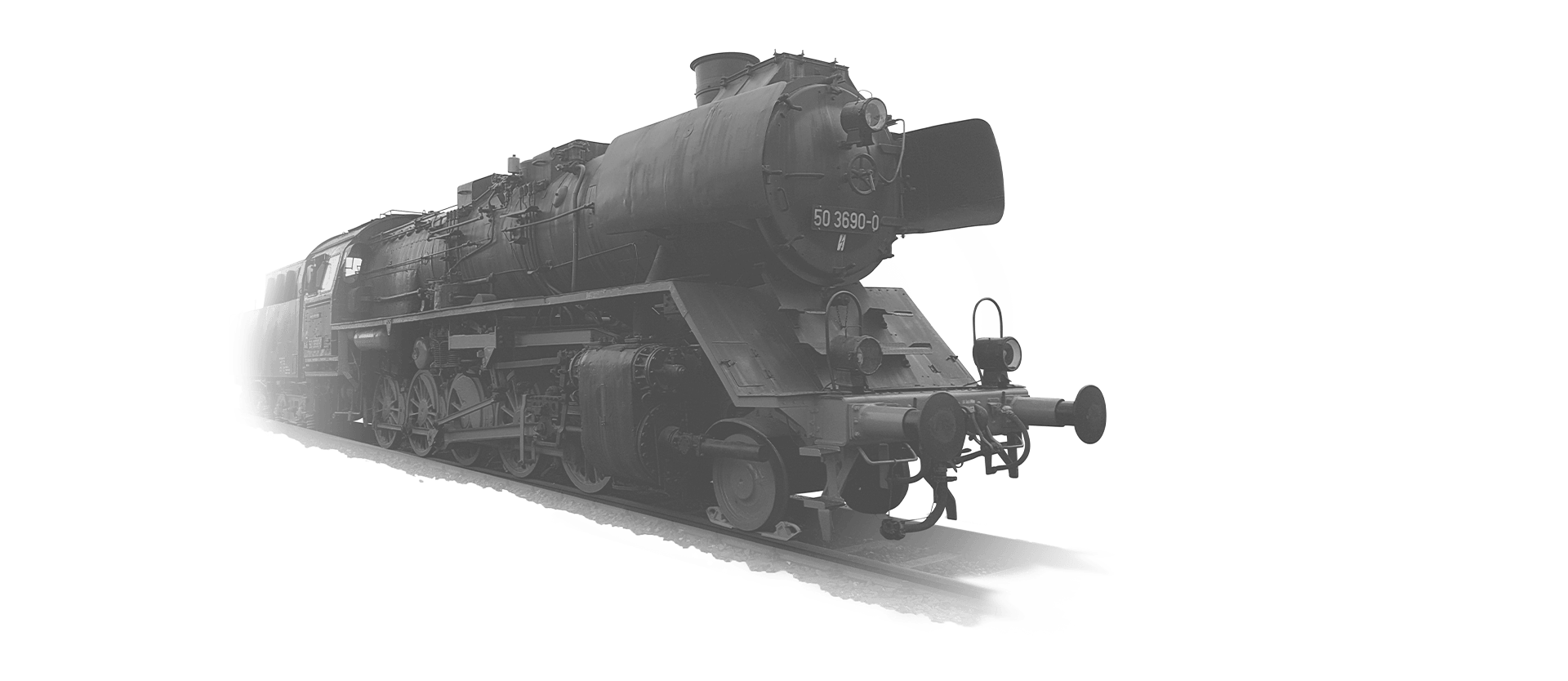 The locomotive 50-3690 is coming towards the camera in black and white