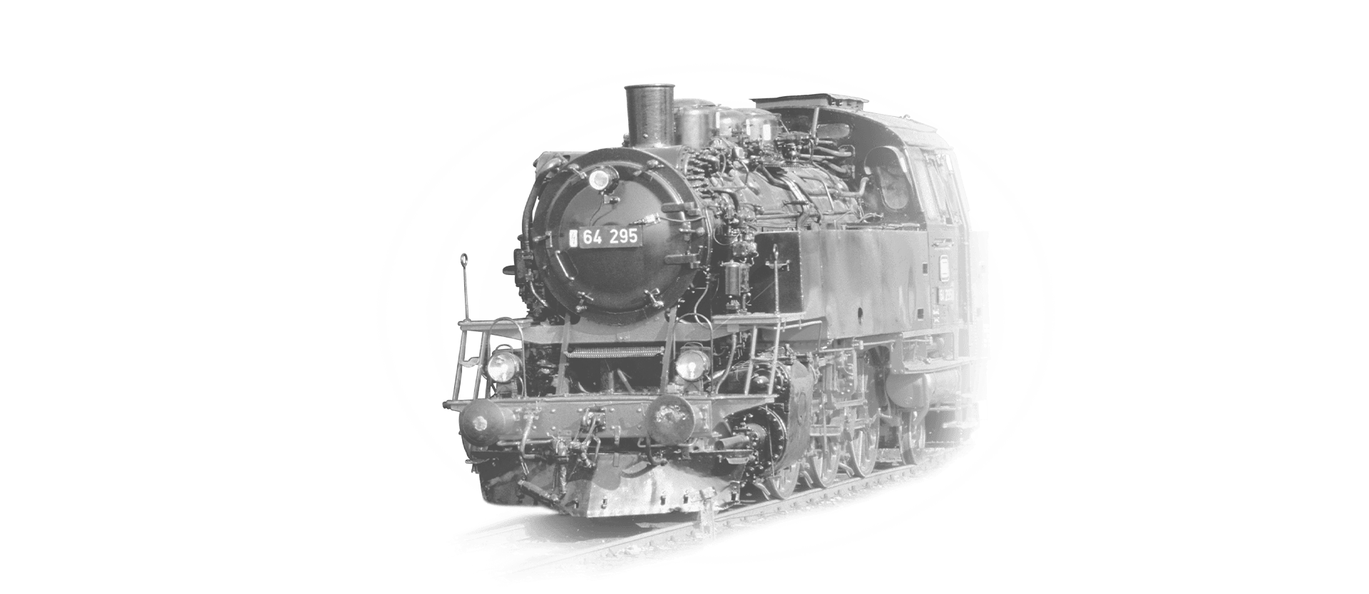 The locomotive 64-295 is coming towards the camera in black and white