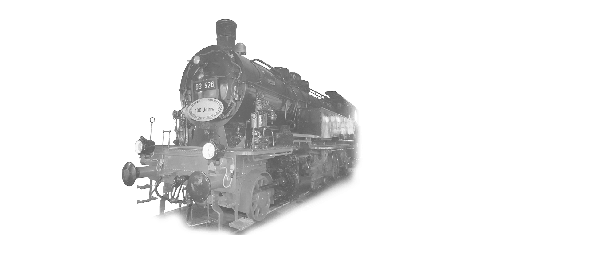 The locomotive 93-526 is coming towards the camera in black and white